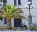 Going to Lakki town on Leros  : Every morning he rode into town and in the evening he went home